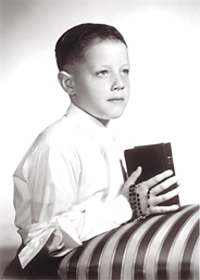 Jack Yaco as a young boy praying